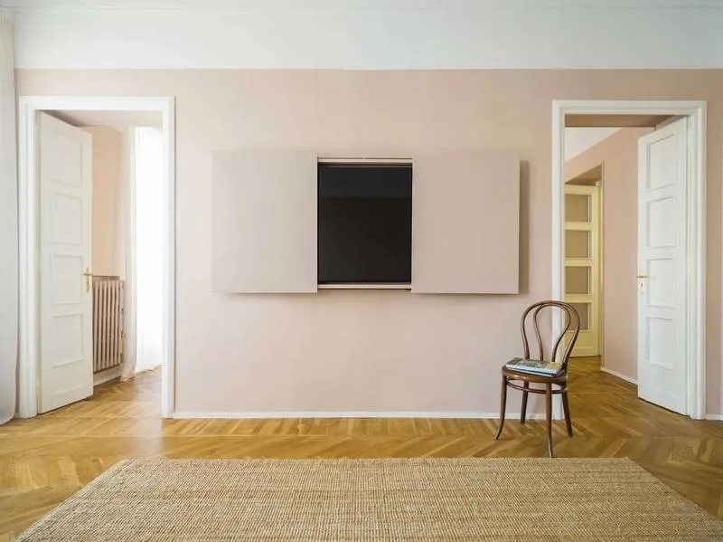 10 inspirujących pomysłów na to, jak schować telewizor w salonie w stylowy sposób