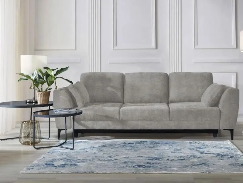 Jak wybrać dywan do szarej kanapy i brązowych mebli, by nie popełnić błędów?