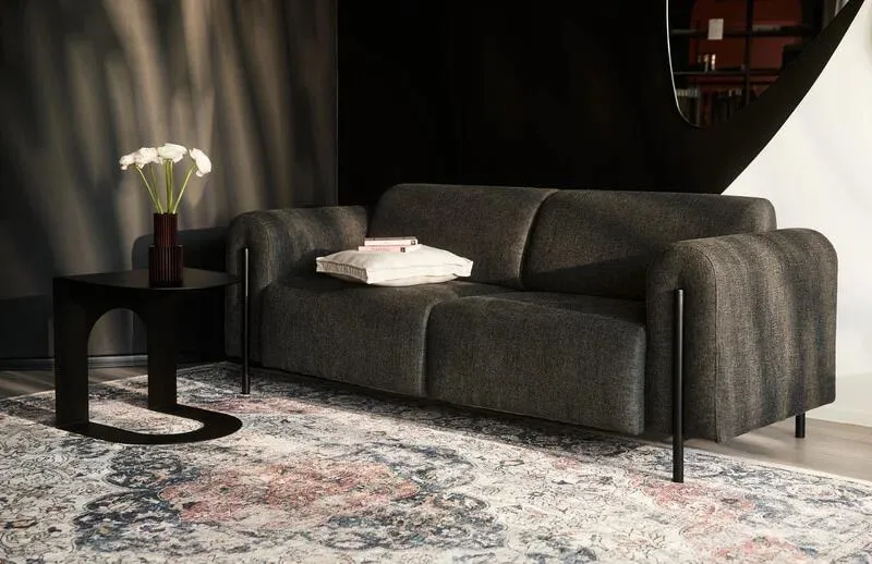 Odkryj najlepsze kolory i style dywanów do czarnej kanapy